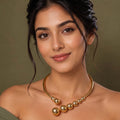 GOLD BEADED NECKLACE